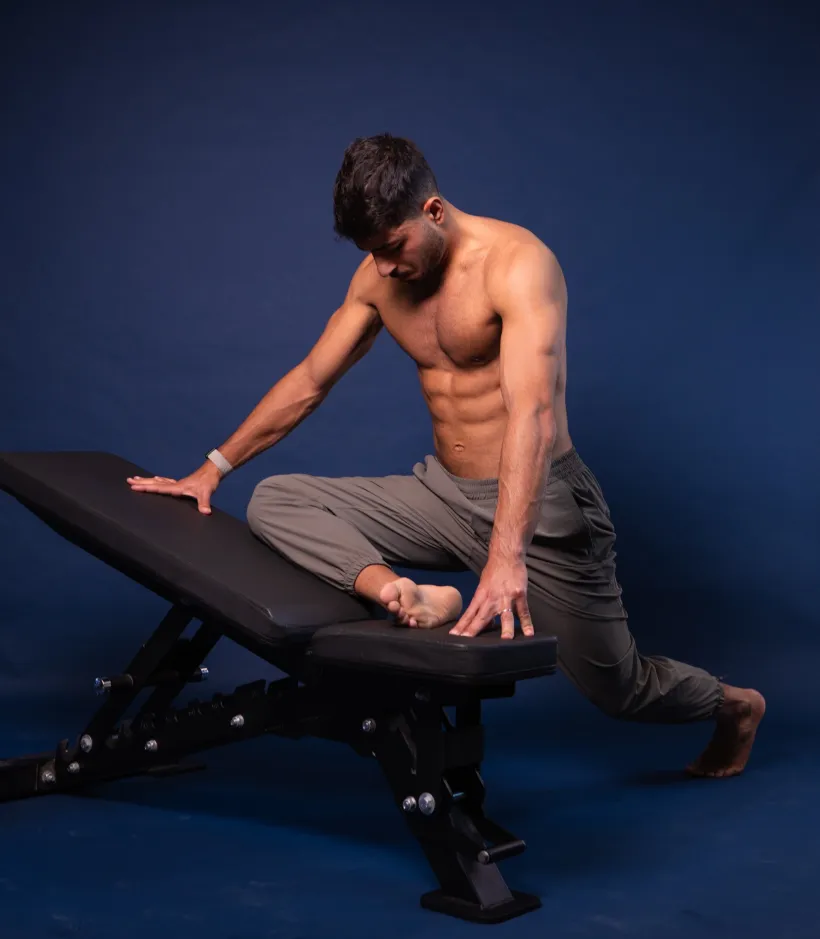 Lael checking ankle range on a bench